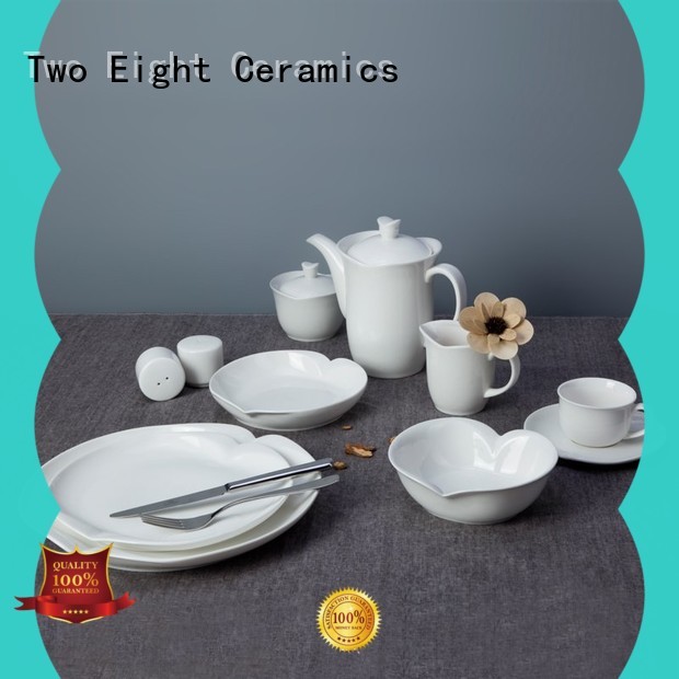 Two Eight piece high quality porcelain dinnerware